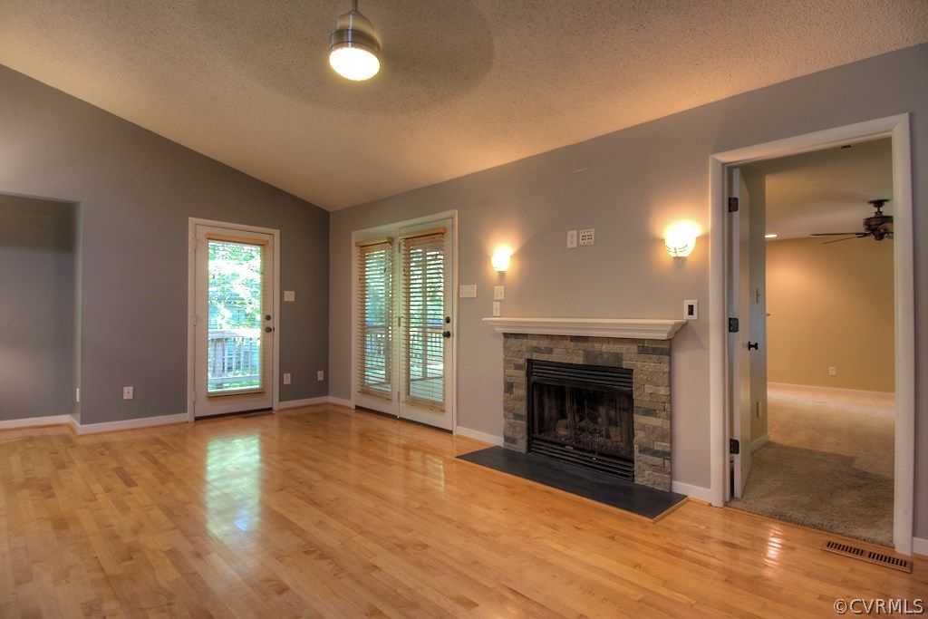 3010 Long Oaks Road Midlothian, VA 23112 - Photo 5 of 30 a view of an empty room with glass door and wooden floor