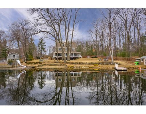 31 Round Road Lunenburg, MA 01462 - Photo 1 of 30 a swimming pool with outdoor seating and trees