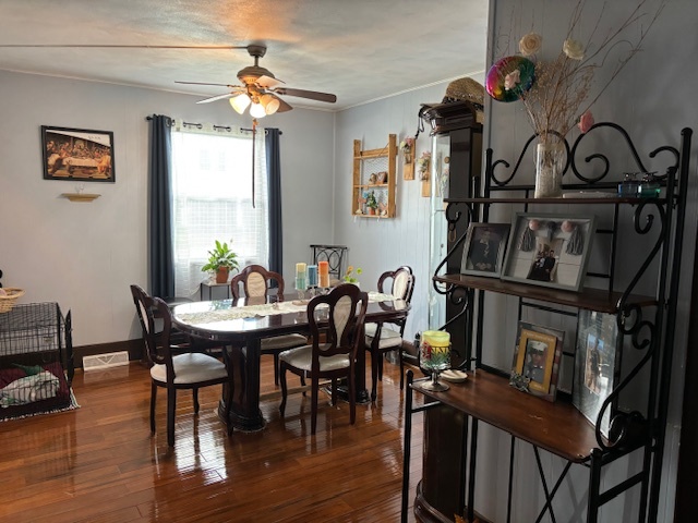 815 North 2nd Street Rochelle, IL 61068 - Photo 12 of 52 a view of a dining room with furniture and wooden floor