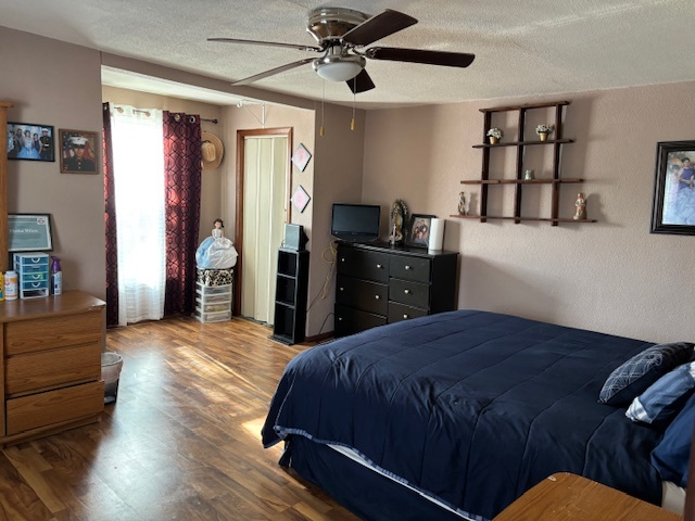 815 North 2nd Street Rochelle, IL 61068 - Photo 30 of 52 a bedroom with a bed and wooden floor