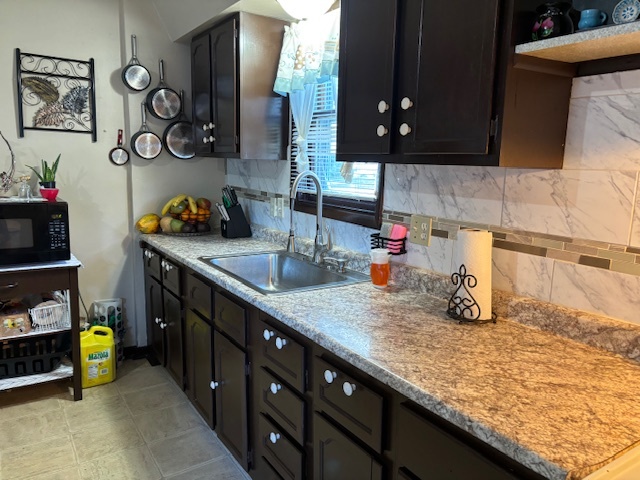 815 North 2nd Street Rochelle, IL 61068 - Photo 5 of 52 a kitchen with sink and cabinets