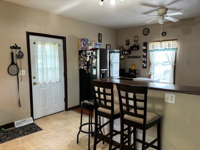 815 North 2nd Street Rochelle, IL 61068 - Photo 8 of 52 a view of a dining room with furniture window and wooden floor