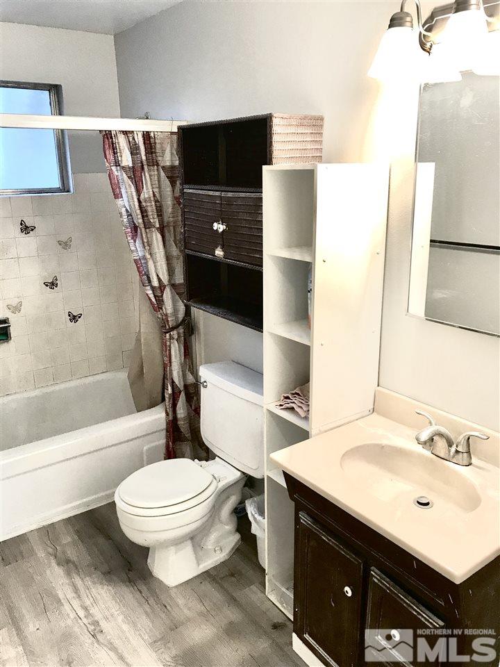 9285 Fremont Way Reno, NV 89506 - Photo 11 of 21 a bathroom with a sink toilet and shower