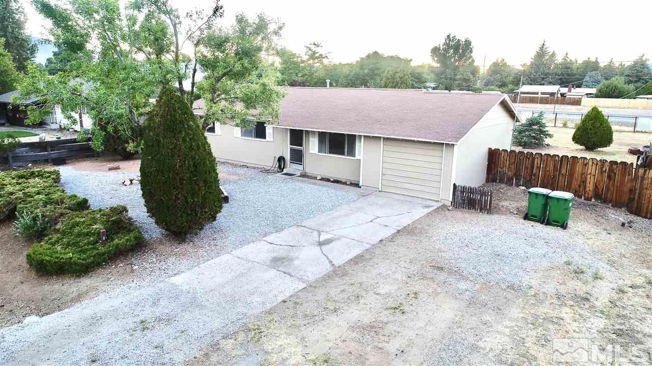 9285 Fremont Way Reno, NV 89506 - Photo 2 of 21 a view of a backyard with a garden and plants