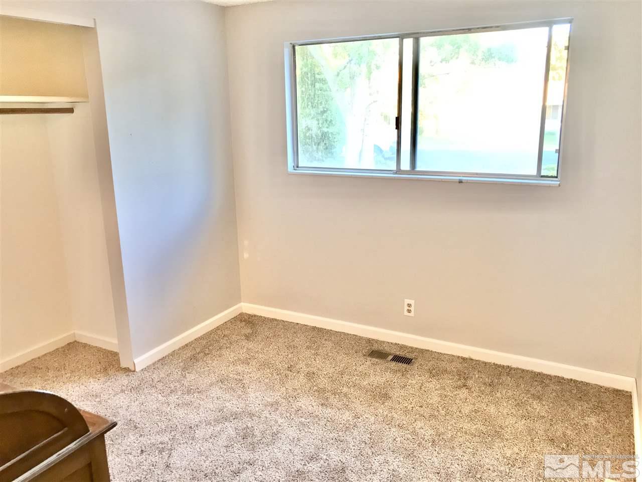 9285 Fremont Way Reno, NV 89506 - Photo 10 of 21 an empty room with a window