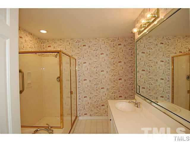 3506 Proprietor Way Raleigh, NC 27612 - Photo 12 of 19 a bathroom with a shower and a sink