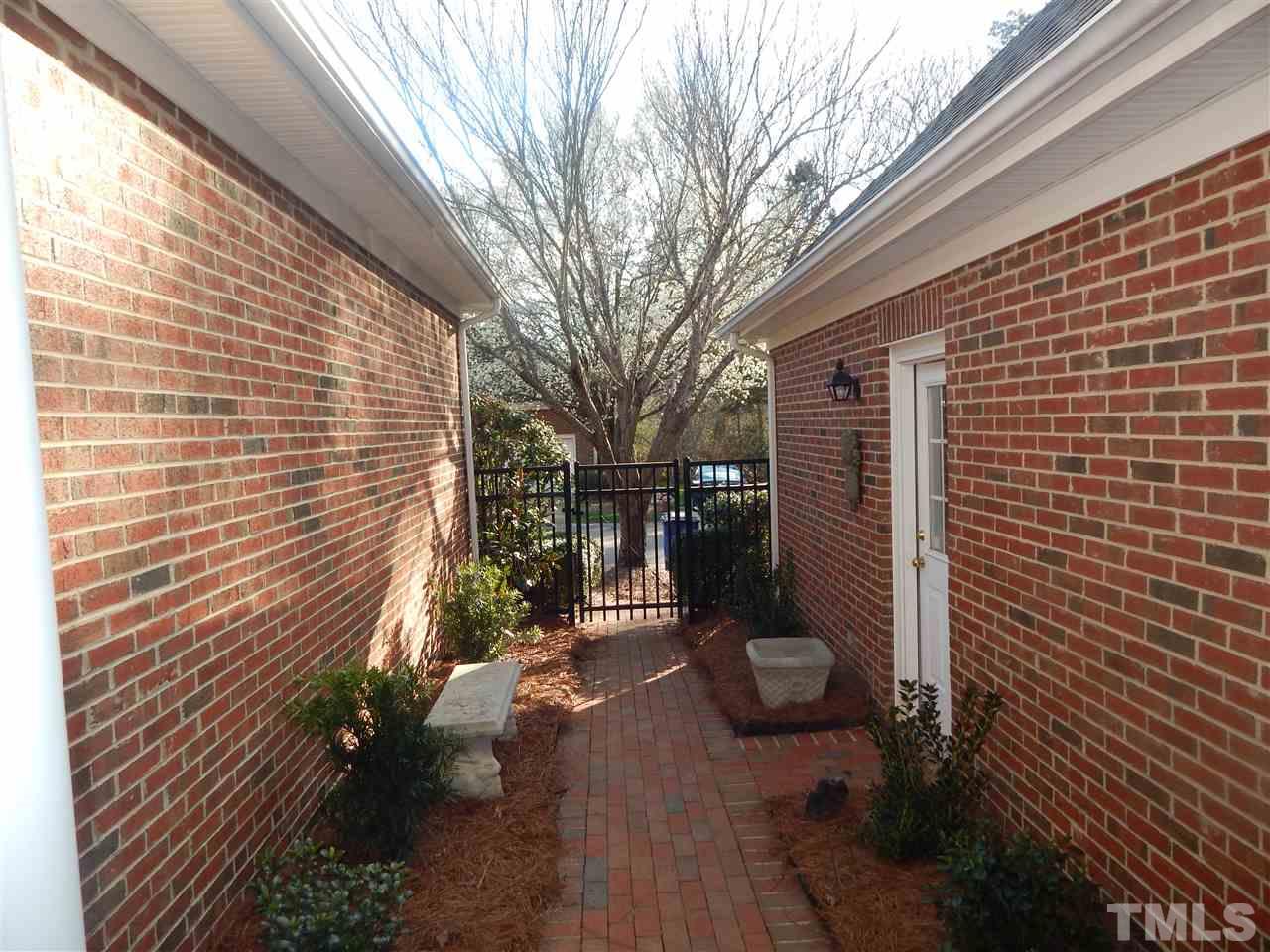 3506 Proprietor Way Raleigh, NC 27612 - Photo 3 of 19 a backyard of a house with seating space