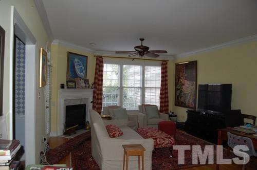 3506 Proprietor Way Raleigh, NC 27612 - Photo 8 of 19 a living room with furniture and a flat screen tv