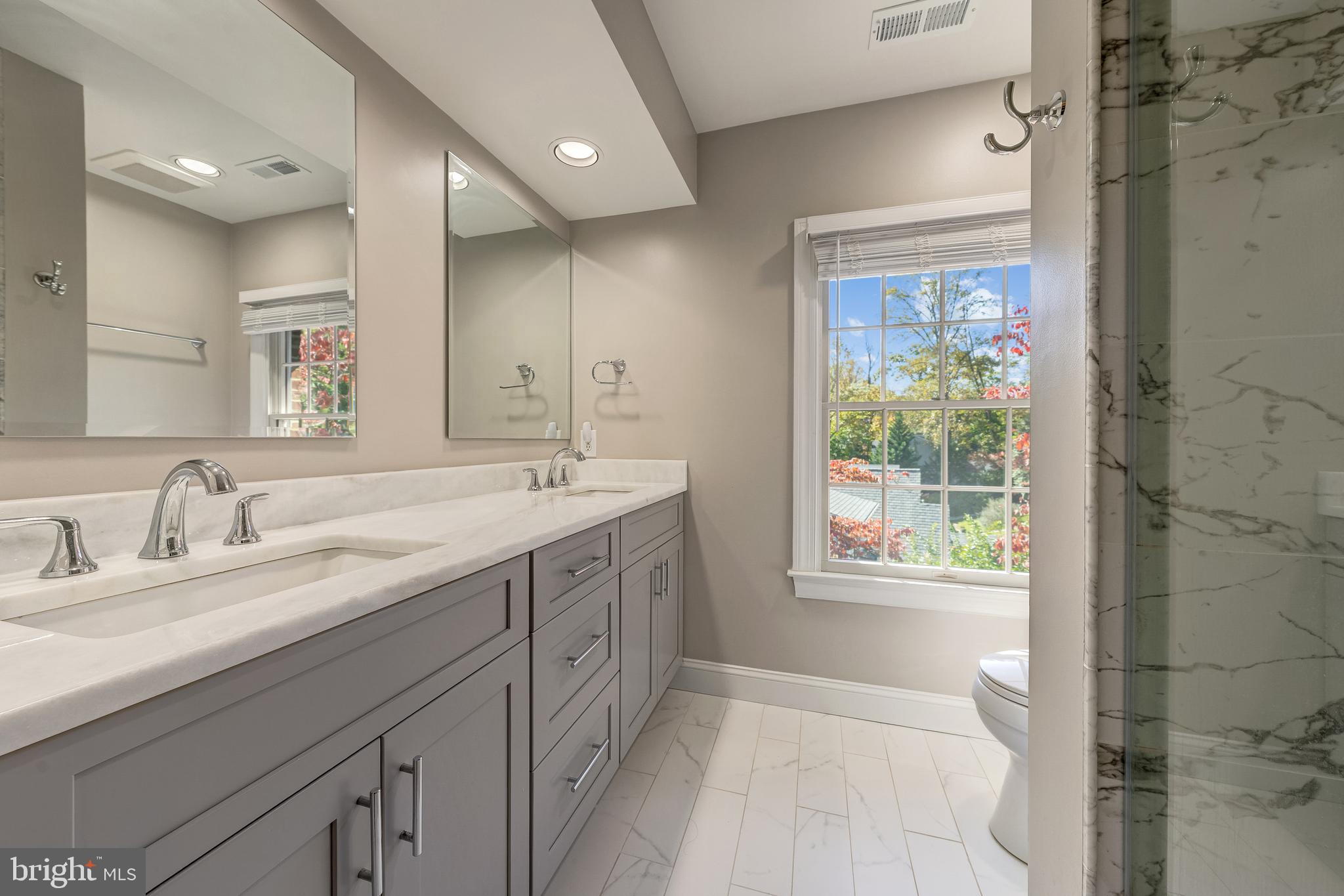 1854 Valley Wood Road McLean, VA 22101 - Photo 40 of 70 2022 3RD BATH; 2 RECTANGULAR SINKS & QUARTZITE