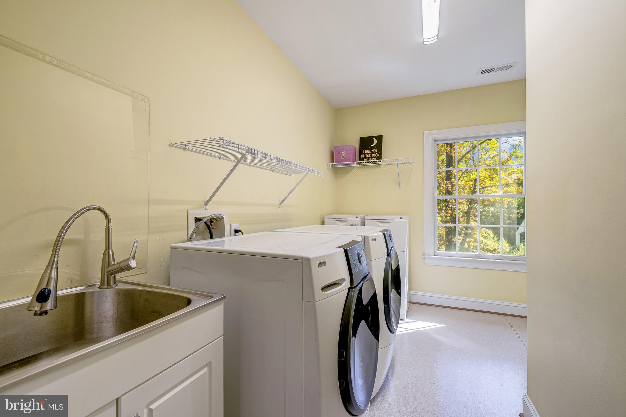 1854 Valley Wood Road McLean, VA 22101 - Photo 44 of 70 BEDROOM LEVEL LAUNDRY ROOM WITH NATURAL LIGHT