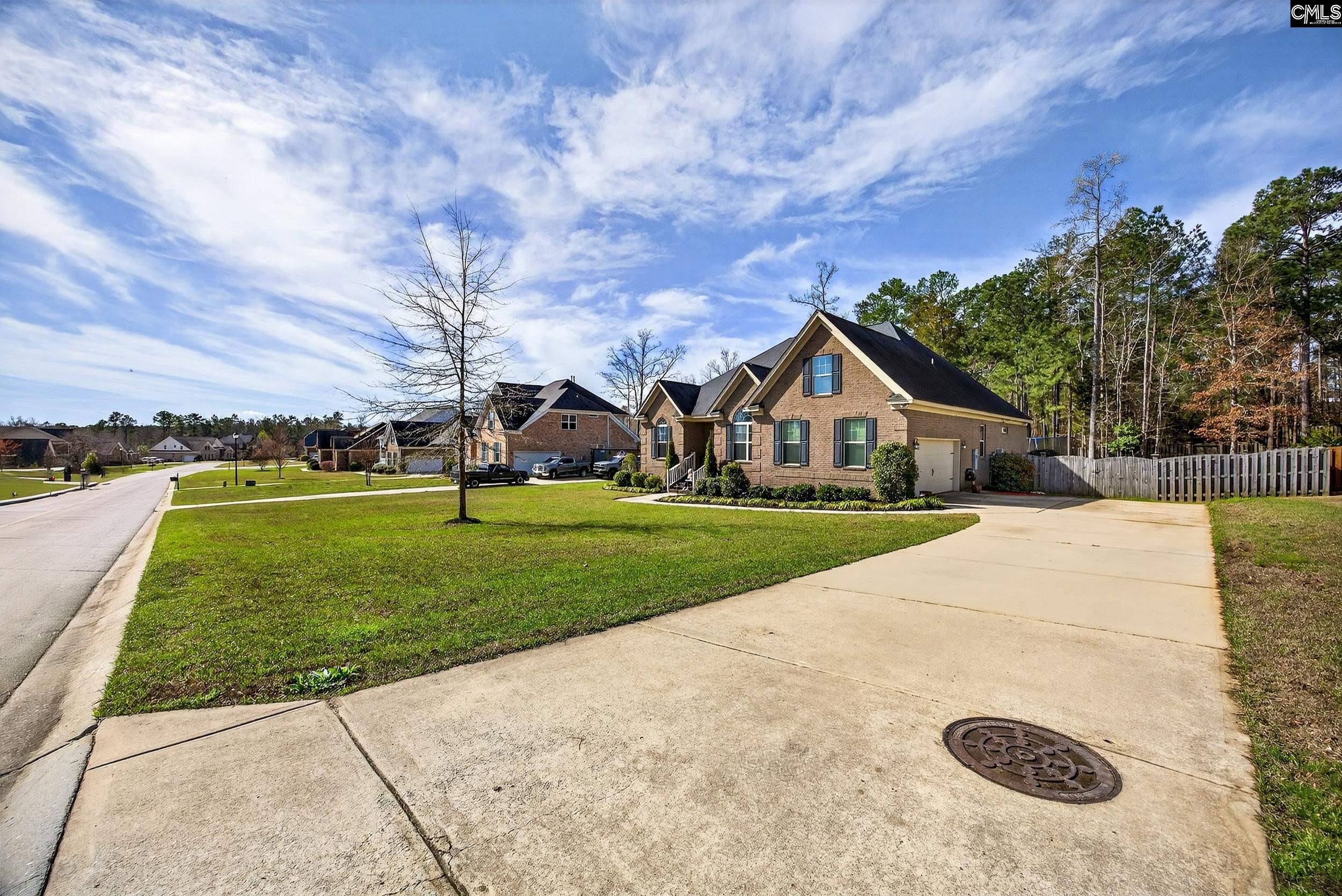116 Renard Way Gilbert, SC 29054 - Photo 5 of 74 a view of house with garden