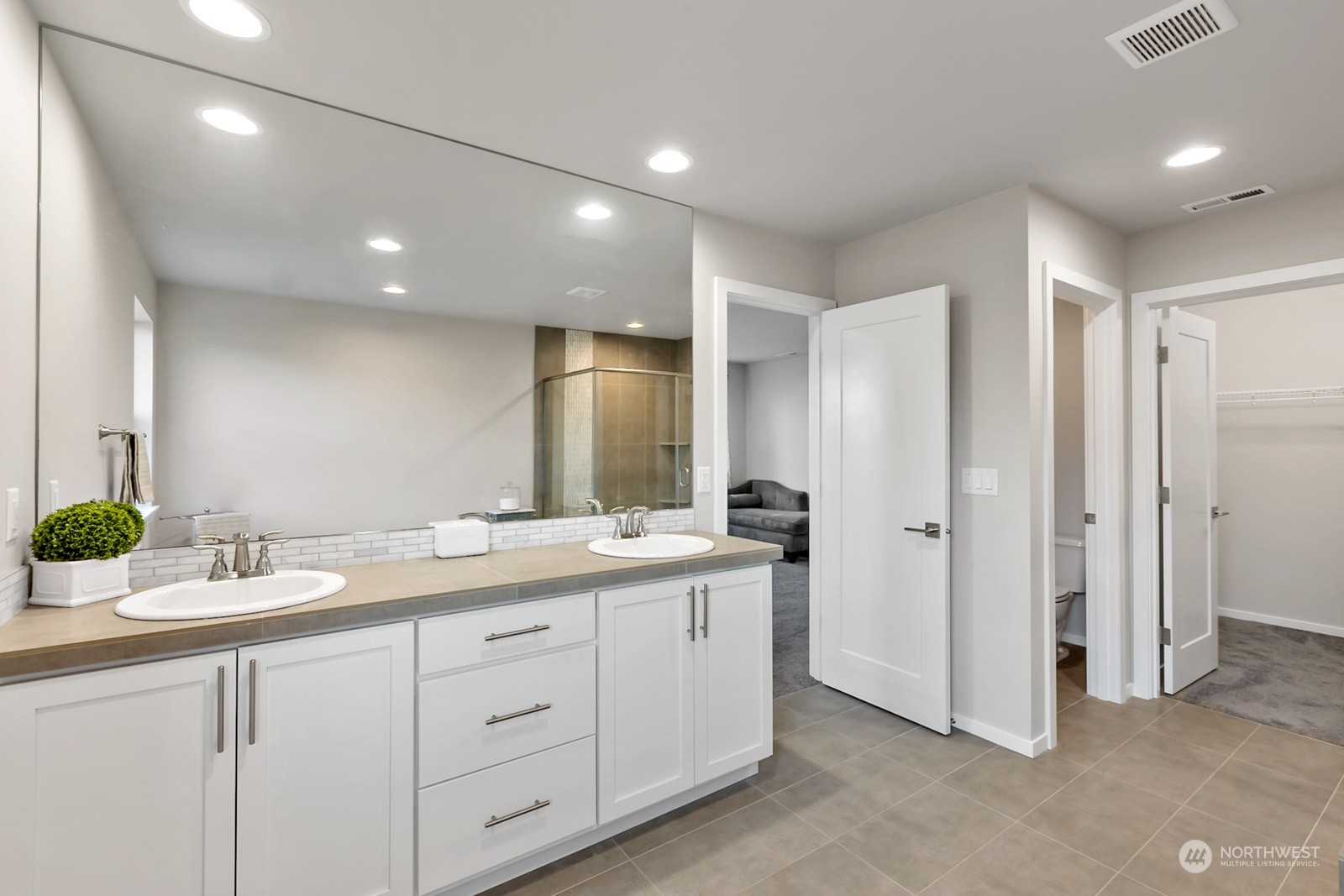 853 South 49th Street Renton, WA 98055 - Photo 20 of 35 a bathroom with a double vanity sink and a mirror