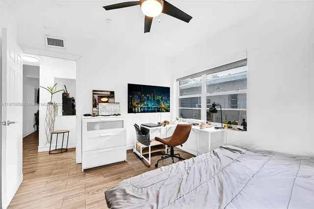 a room with a bed and a table