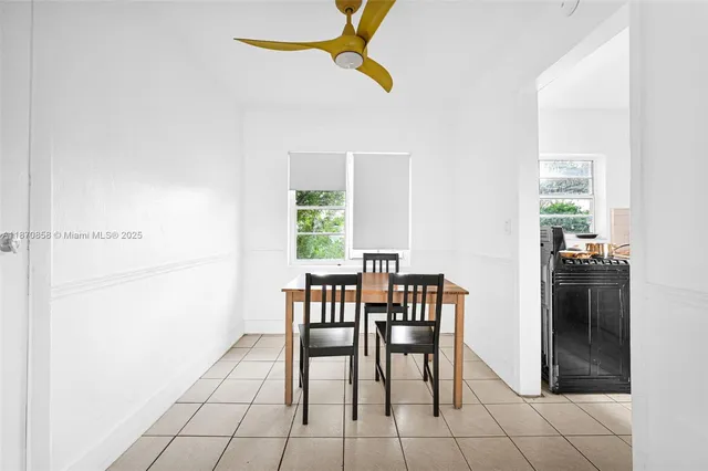 a bedroom with furniture and a flat screen tv