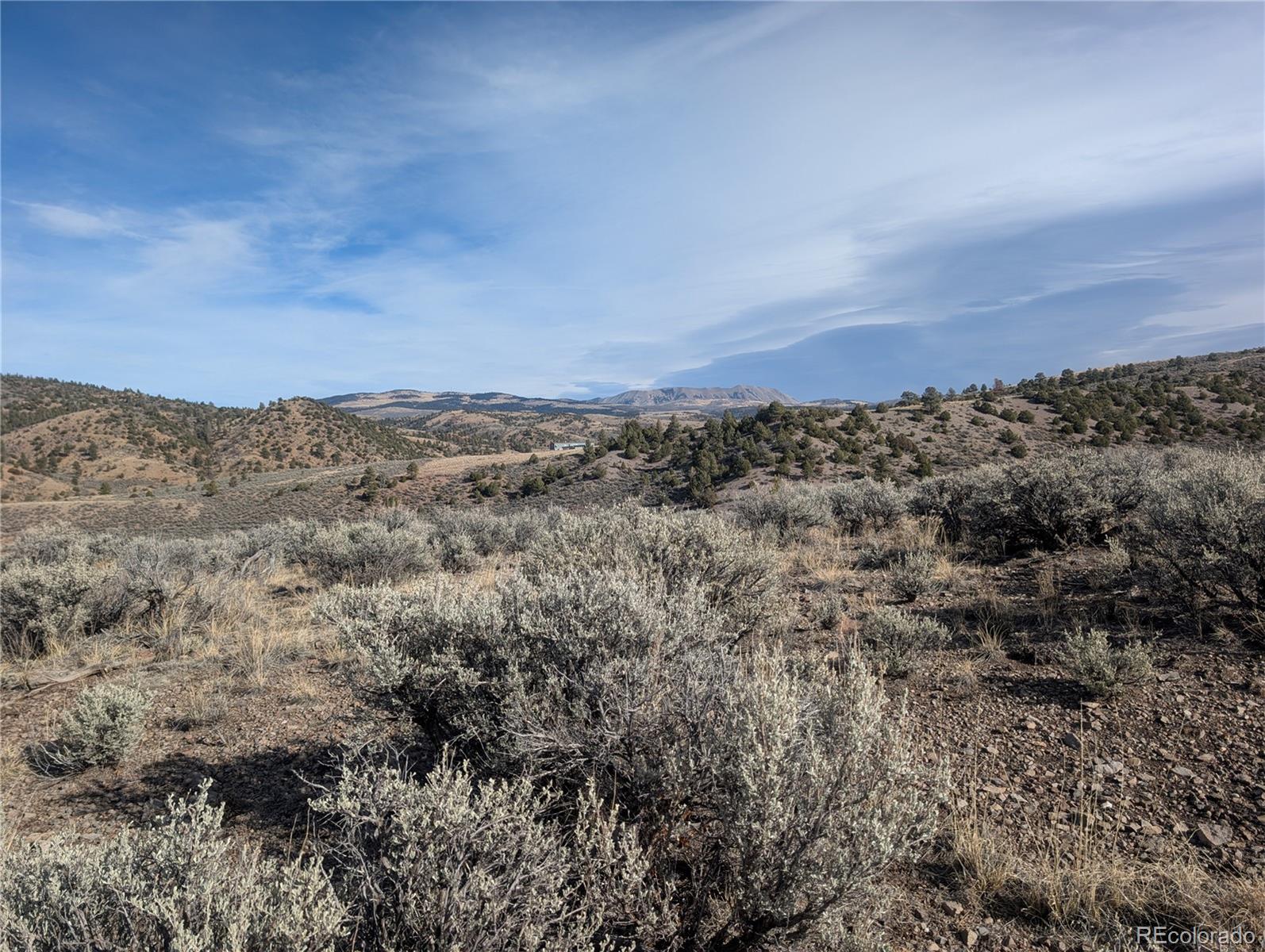 Lot 4822 Spencer Road Fort Garland, CO 81133 - Photo 4 of 14 an aerial view of houses covered in trees