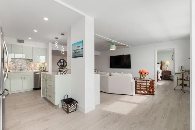 a living room with furniture and a table