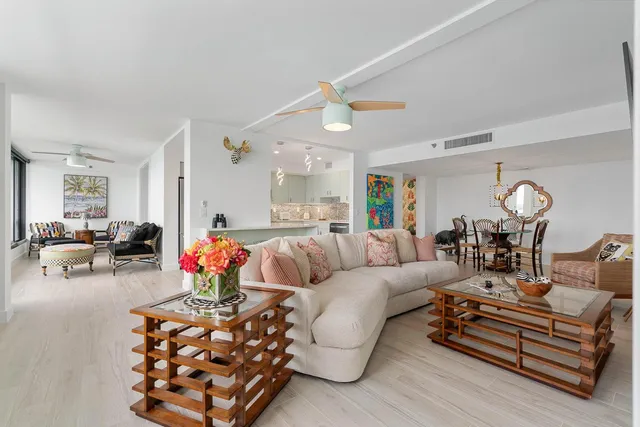 a bedroom with a large bed and a tv