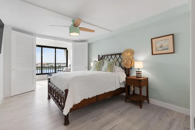 a bedroom with a bed and a view of bedroom