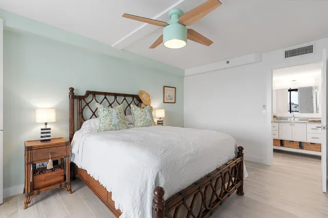 a bathroom with a shower and a toilet