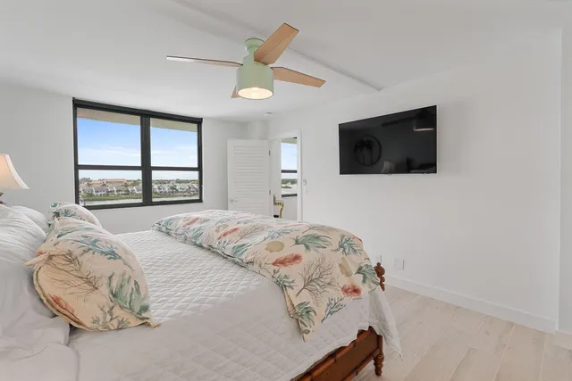 a en suite bathroom with double vanity sink and a window