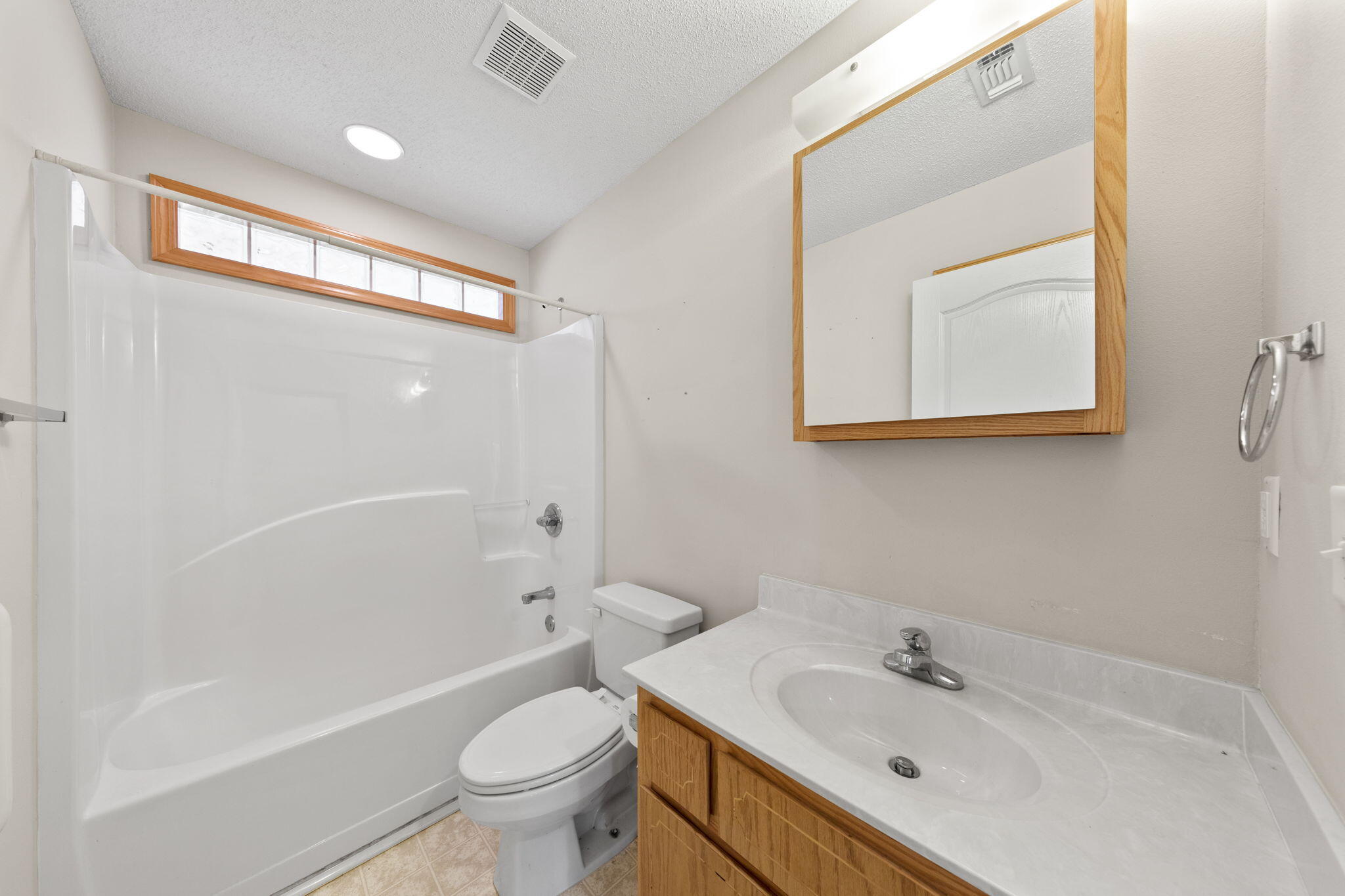 3435 Fl-2 Laurel Hill Laurel Hill, FL 32567 - Photo 15 of 39 a bathroom with a sink a toilet and shower