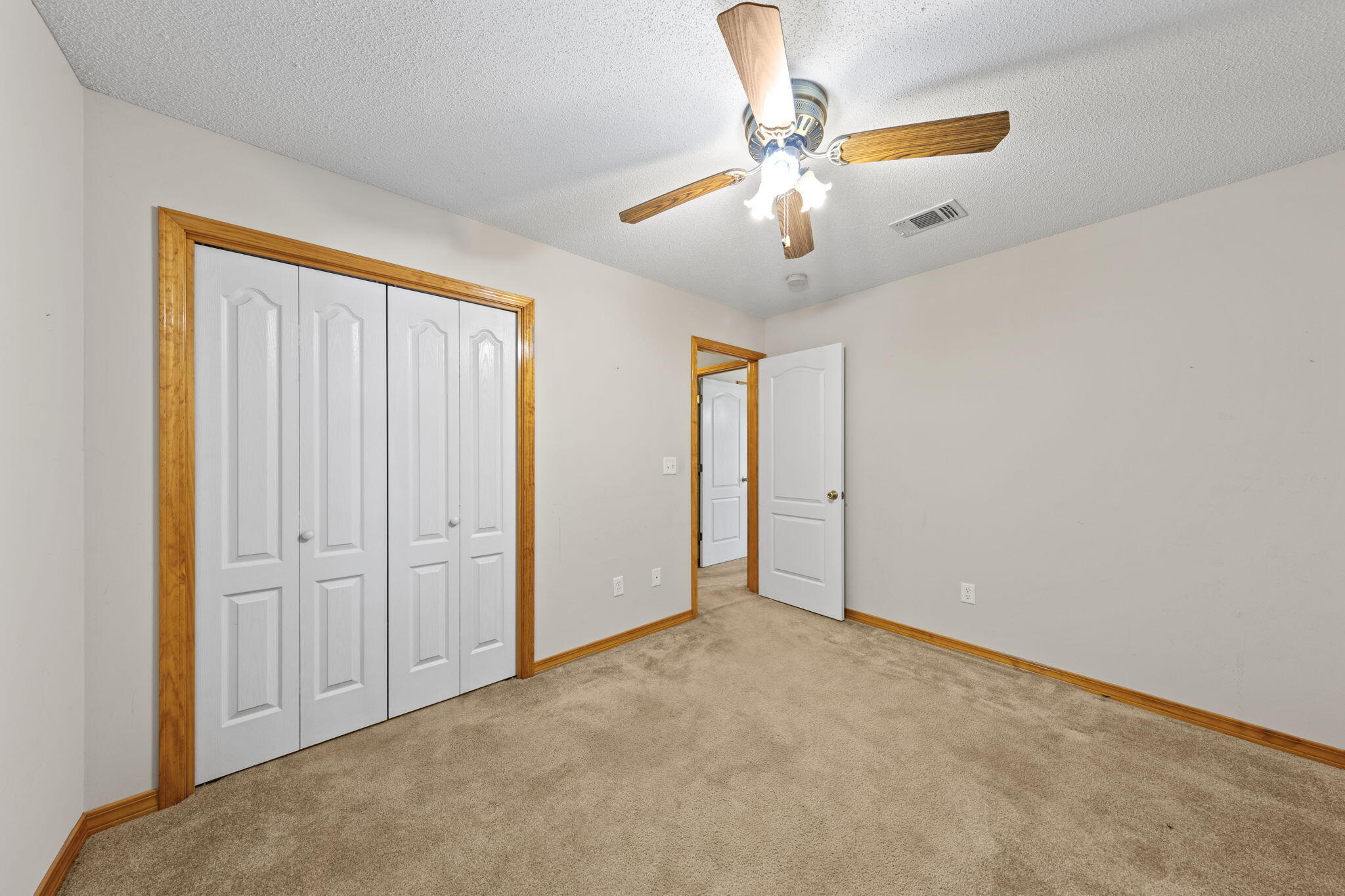 3435 Fl-2 Laurel Hill Laurel Hill, FL 32567 - Photo 17 of 39 an empty room with fan
