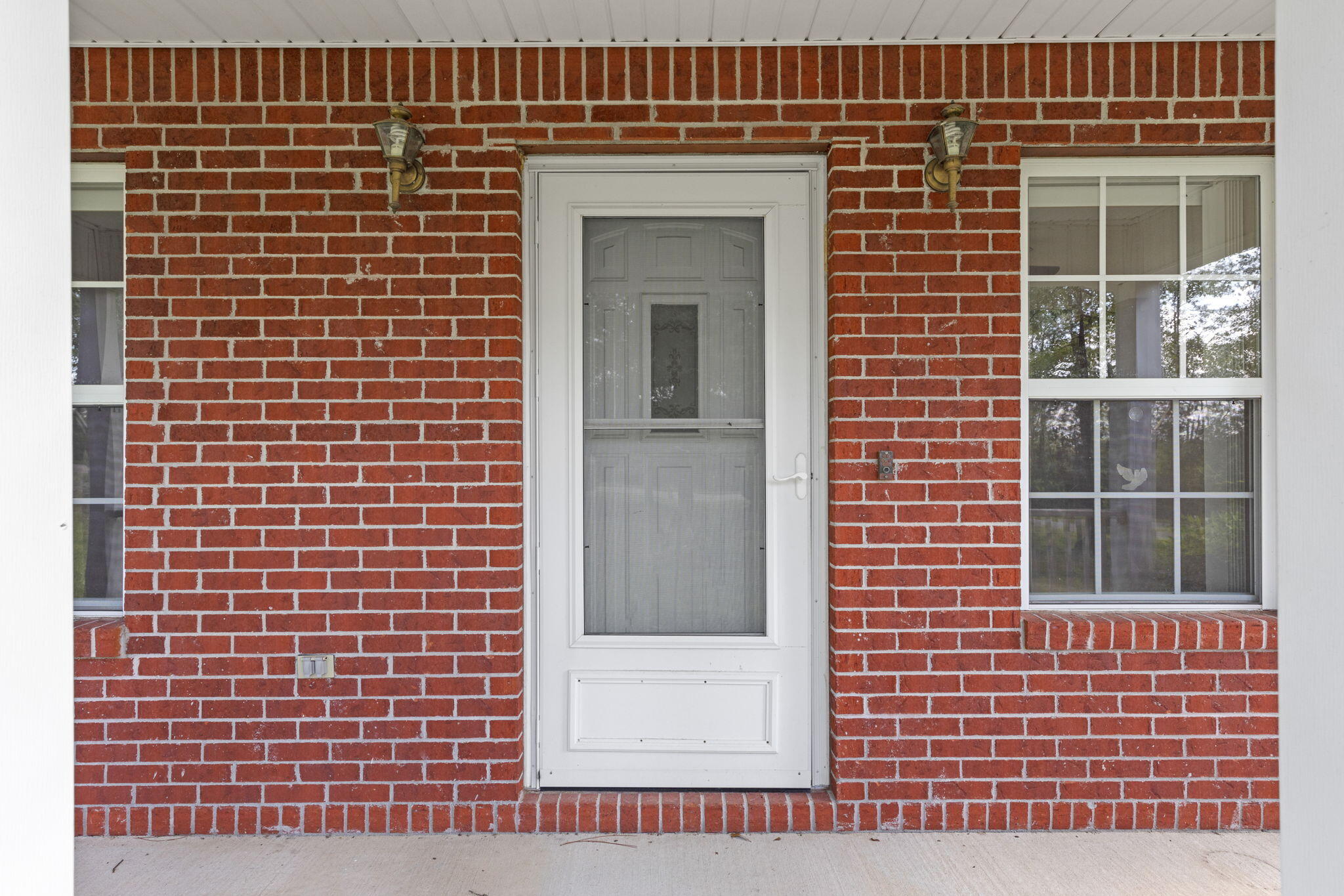 3435 Fl-2 Laurel Hill Laurel Hill, FL 32567 - Photo 30 of 39 a view of front door of house