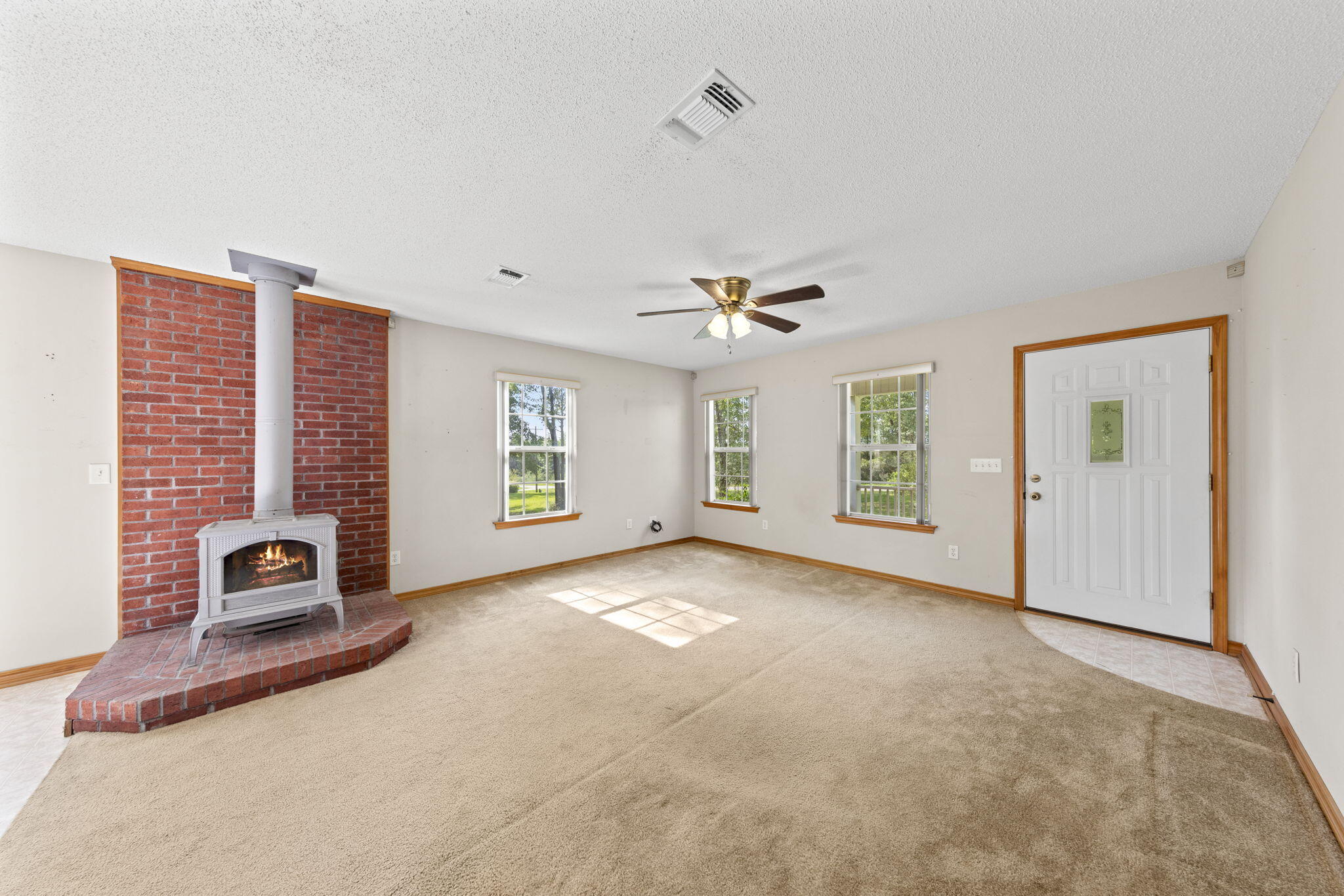 3435 Fl-2 Laurel Hill Laurel Hill, FL 32567 - Photo 5 of 39 a view of an empty room with a window