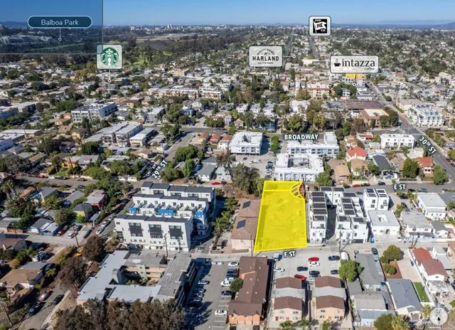 an aerial view of residential building and parking space