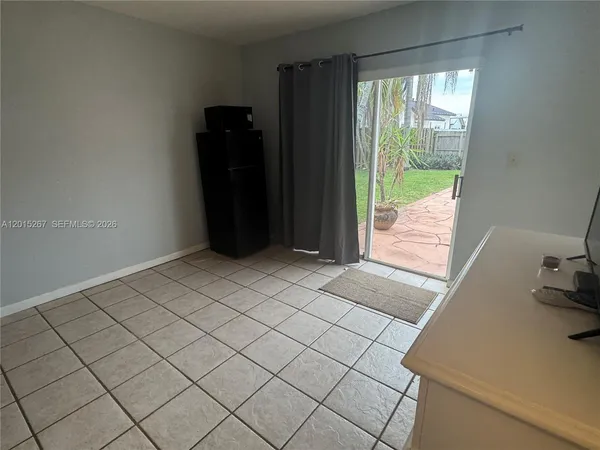 a view of an empty room and window