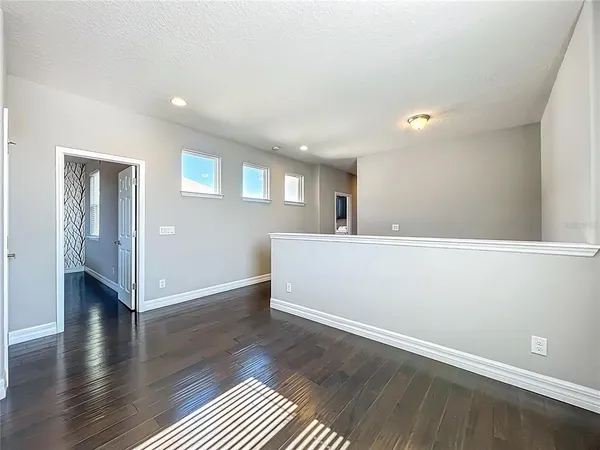 a bathroom with a tub and a shower