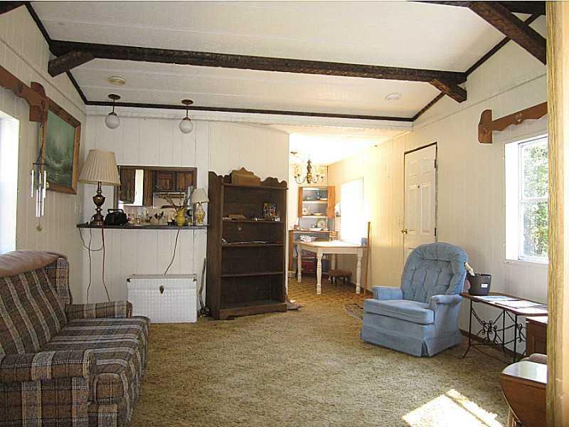 9 Hardy Point Road Pembroke, ME 04666 - Photo 7 of 19 Living Room. Looking from Master bed...