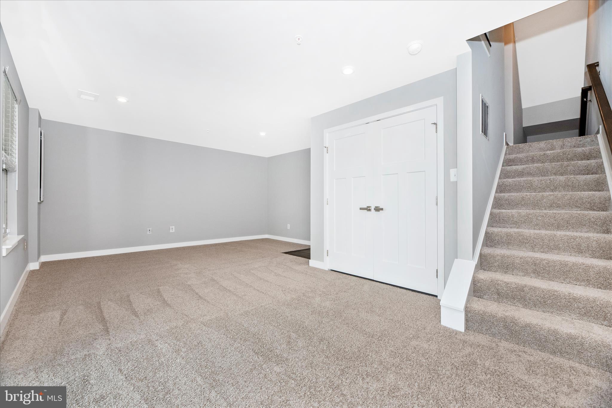 7091 Kokanee Way New Market, MD 21774 - Photo 37 of 69 a view of an empty room with stairs
