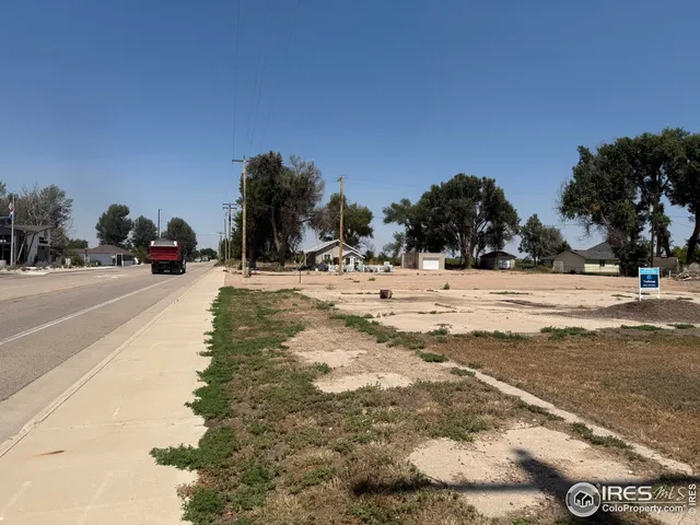 a view of road with trees