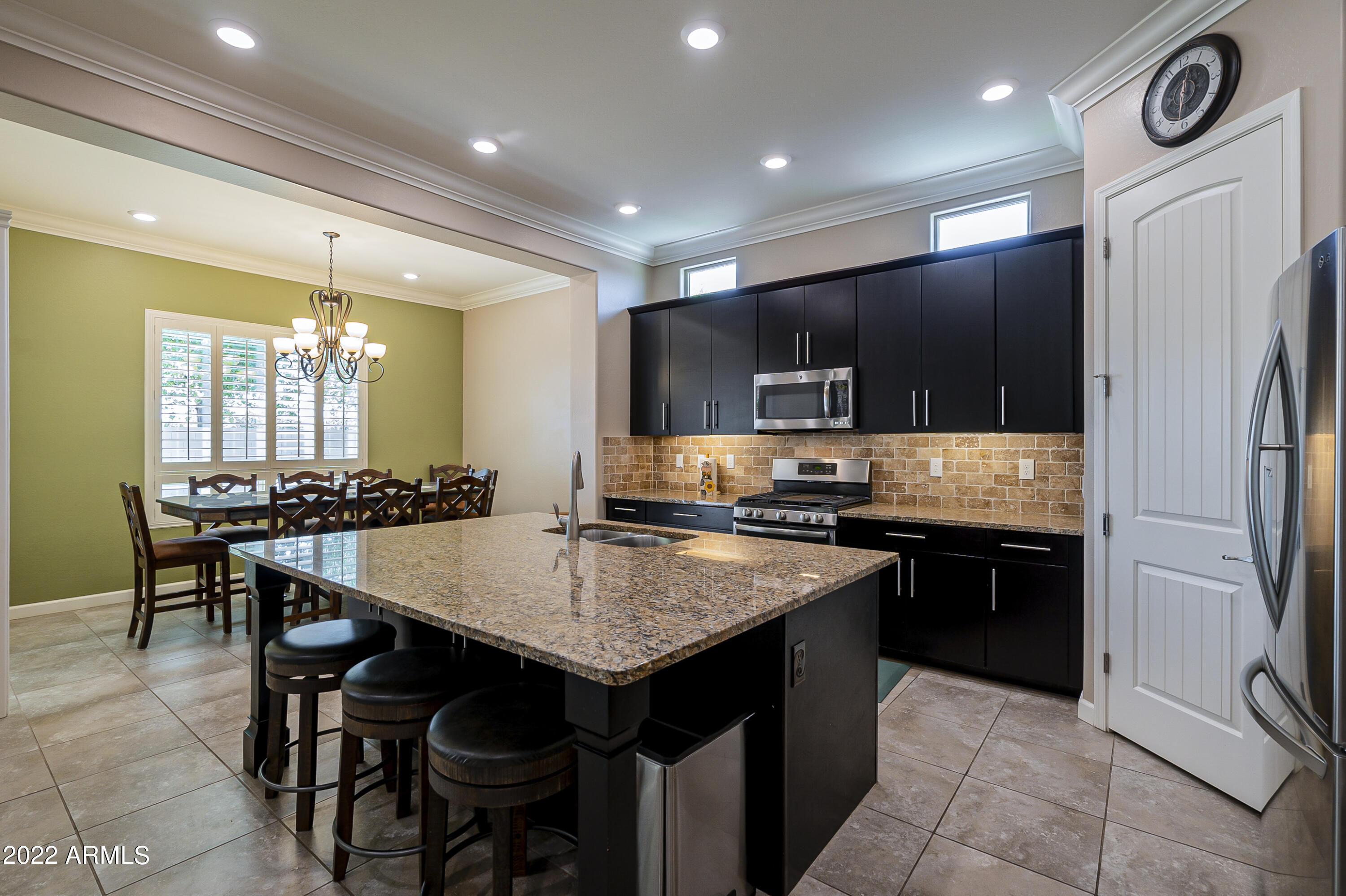 1151 East Reliant Street Gilbert, AZ 85298 - Photo 14 of 68 KITCHEN AND DINING AREA