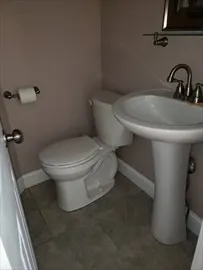 a bathroom with a sink and a toilet