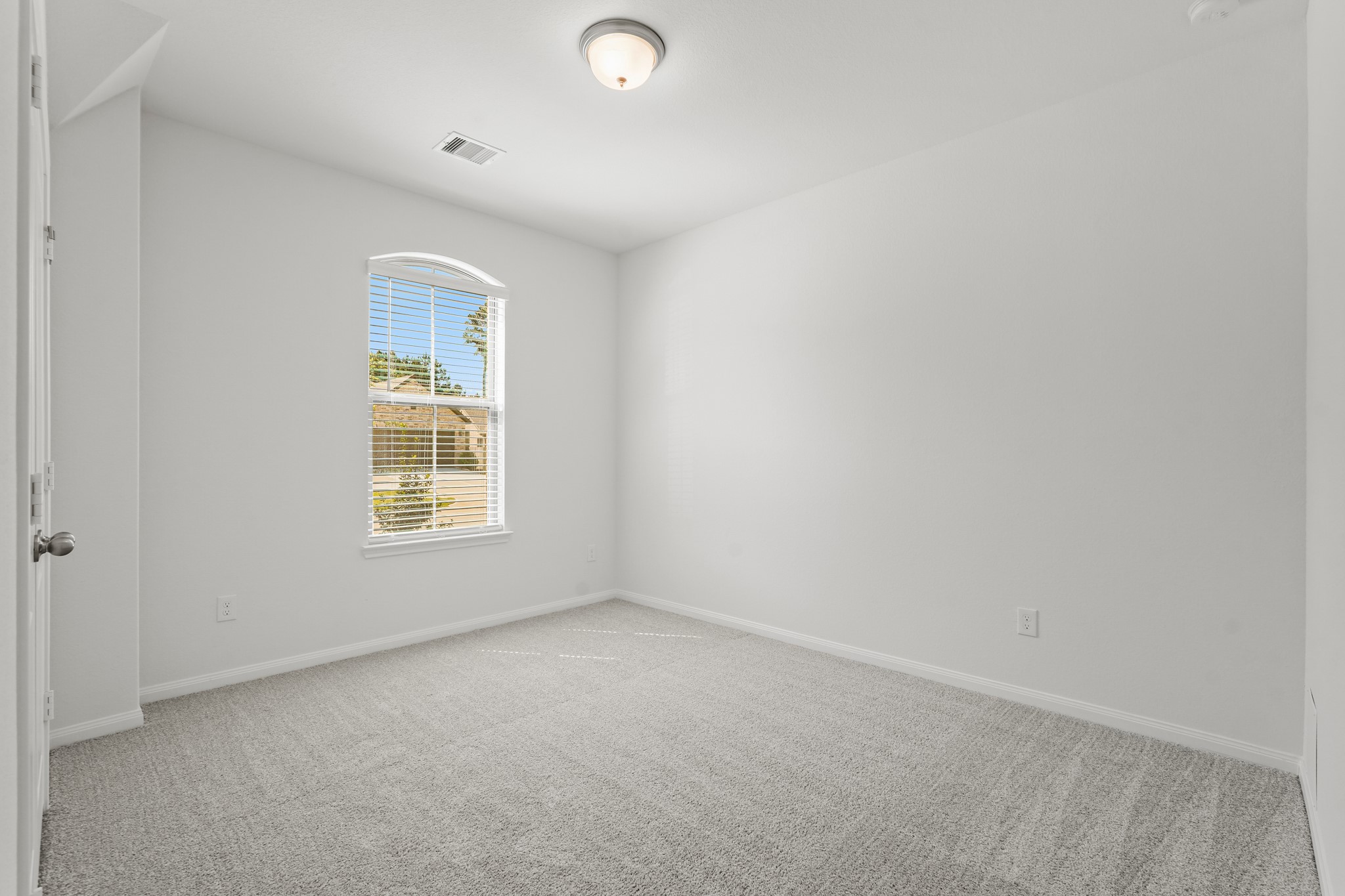 1420 Florecer Lane Magnolia, TX 77354 - Photo 4 of 22 an empty room with a window