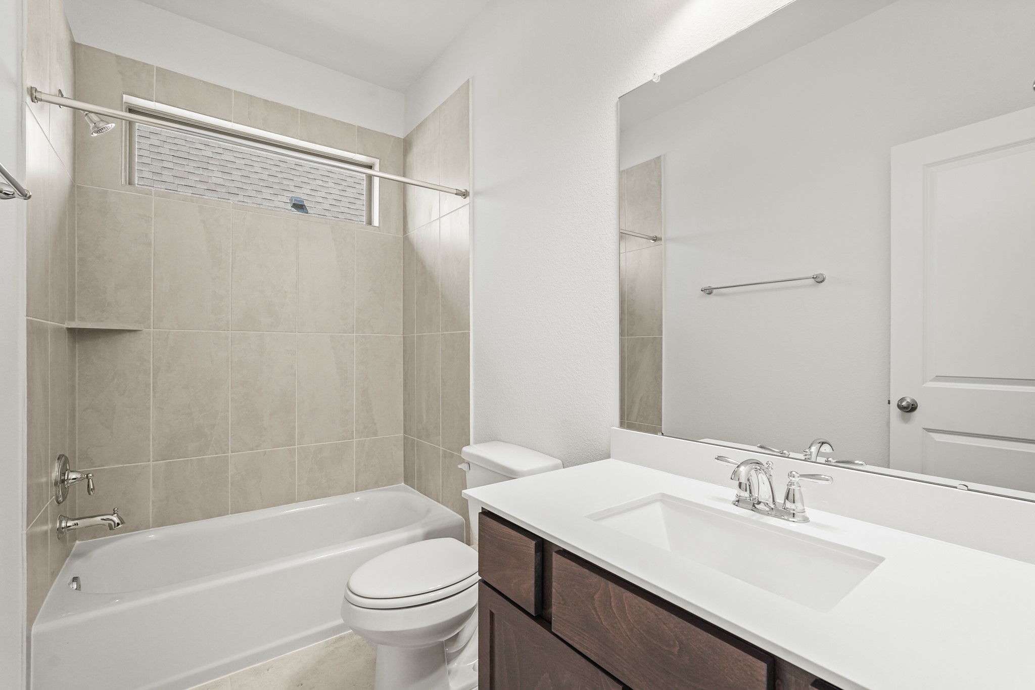 1420 Florecer Lane Magnolia, TX 77354 - Photo 5 of 22 a bathroom with a sink a toilet and a mirror