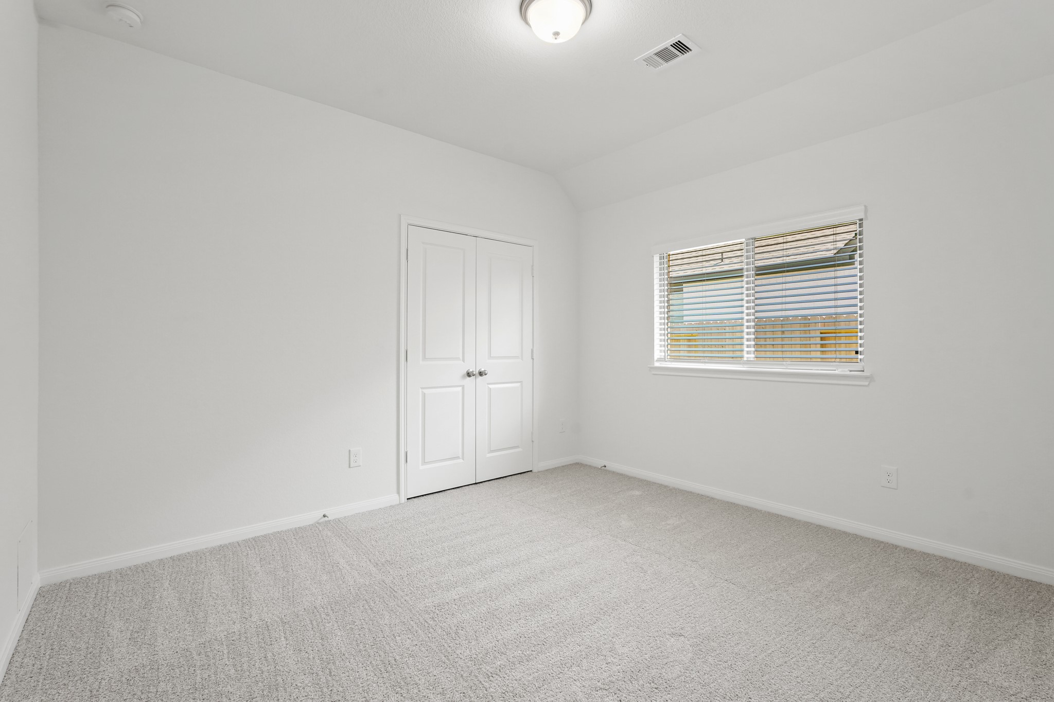 1420 Florecer Lane Magnolia, TX 77354 - Photo 7 of 22 a view of an empty room with a window