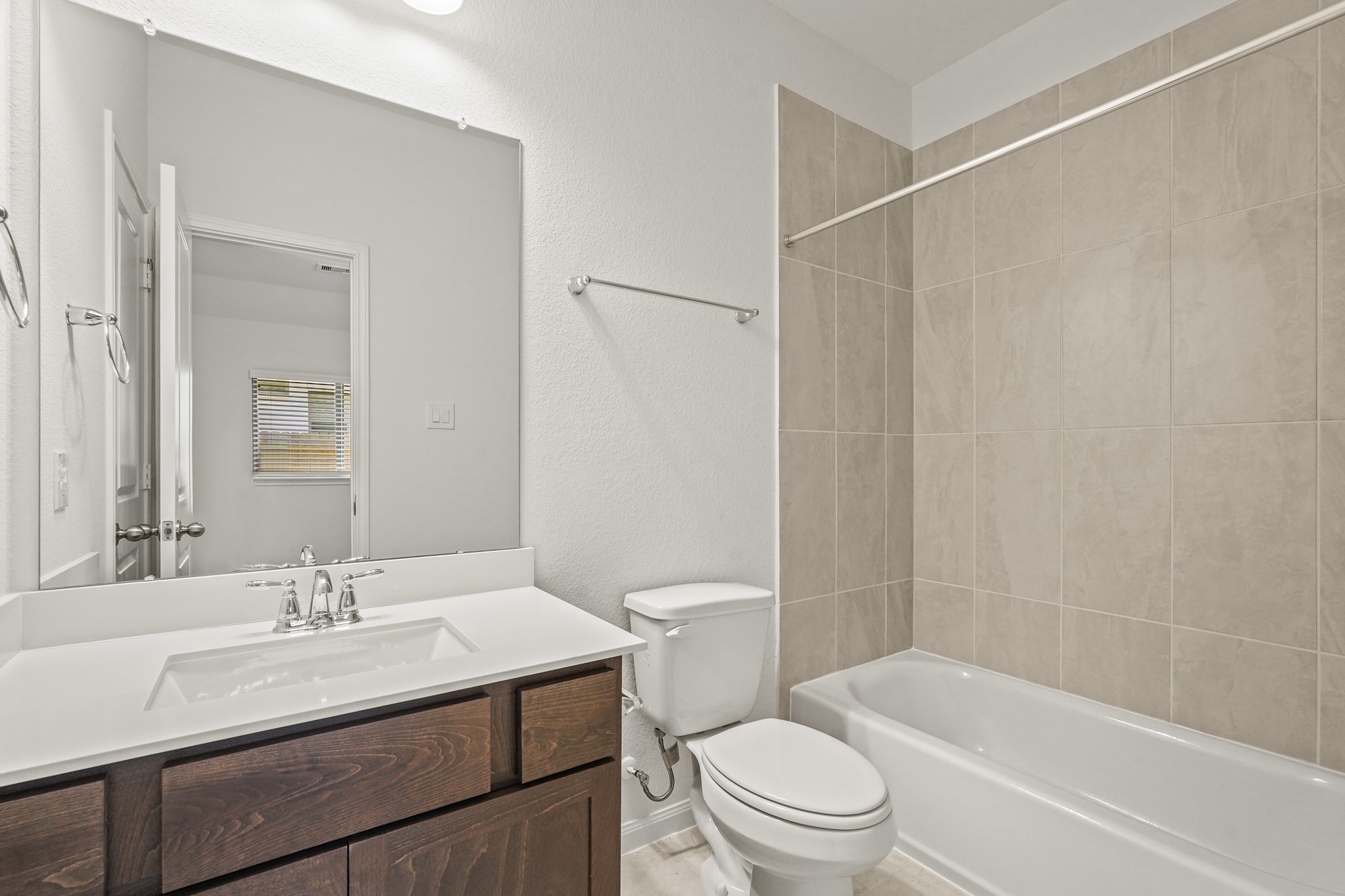 1420 Florecer Lane Magnolia, TX 77354 - Photo 8 of 22 a bathroom with a sink toilet vanity and shower