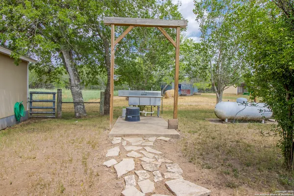 a backyard of a house with seating space