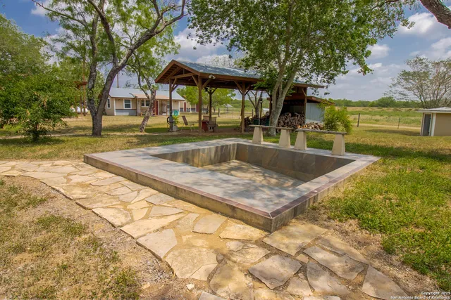 a view of outdoor space with swimming pool