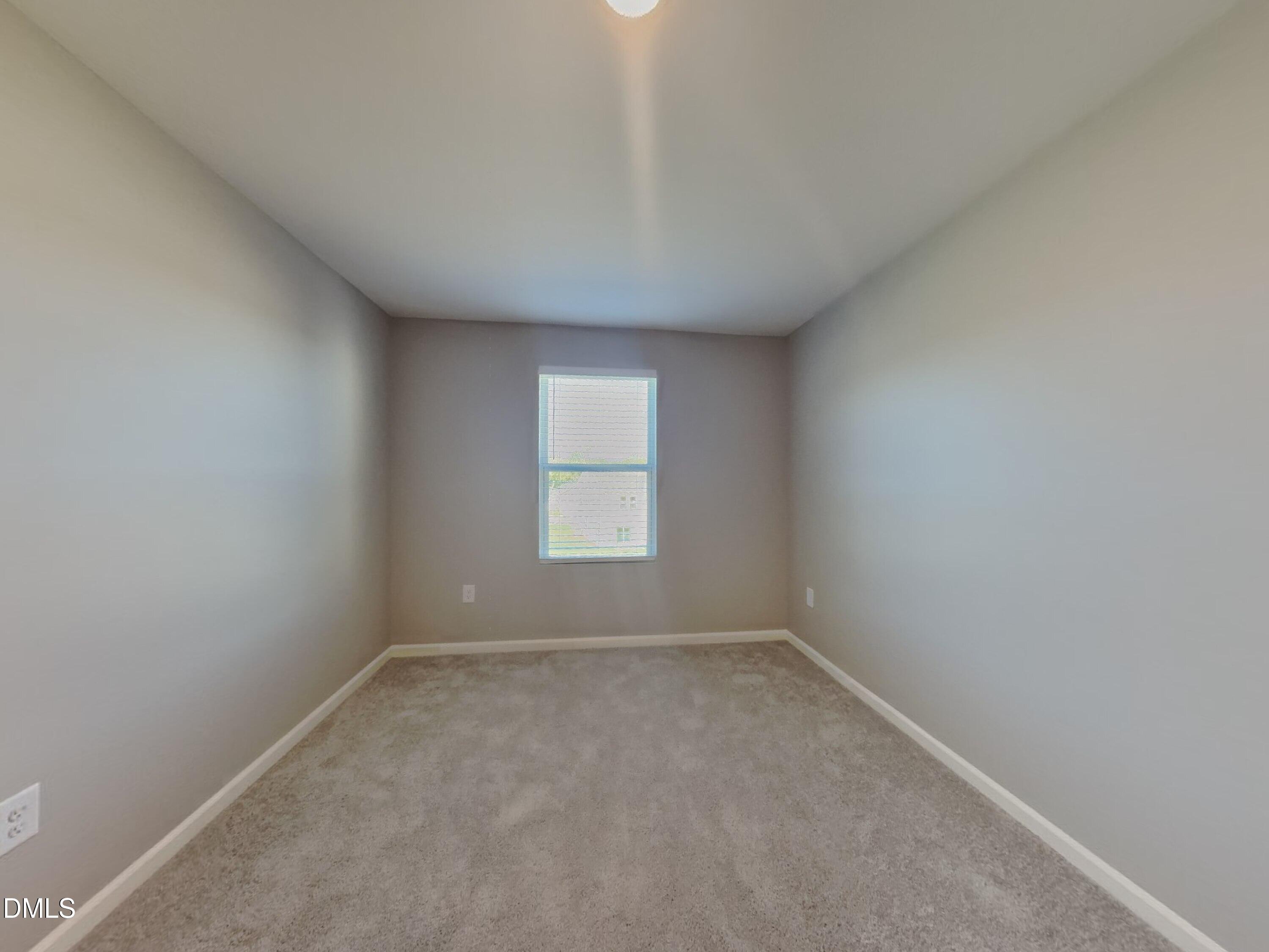 152 Glad Stone Loop Clayton, NC 27520 - Photo 18 of 20 a view of room and window