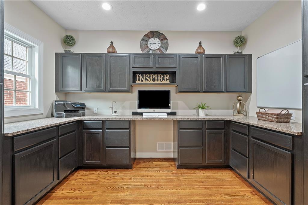 192 Baldwin Road Carnegie, PA 15106 - Photo 12 of 50 a kitchen with kitchen island granite countertop a sink cabinets and stainless steel appliances