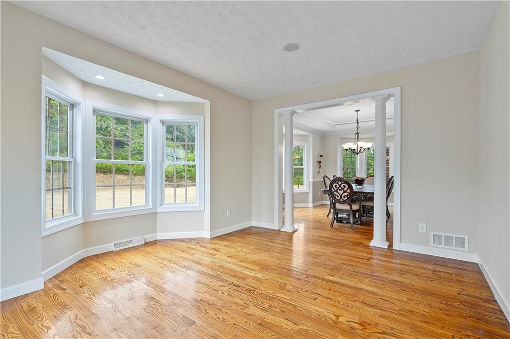 192 Baldwin Road Carnegie, PA 15106 - Photo 23 of 50 a view of a livingroom with wooden floor and furniture
