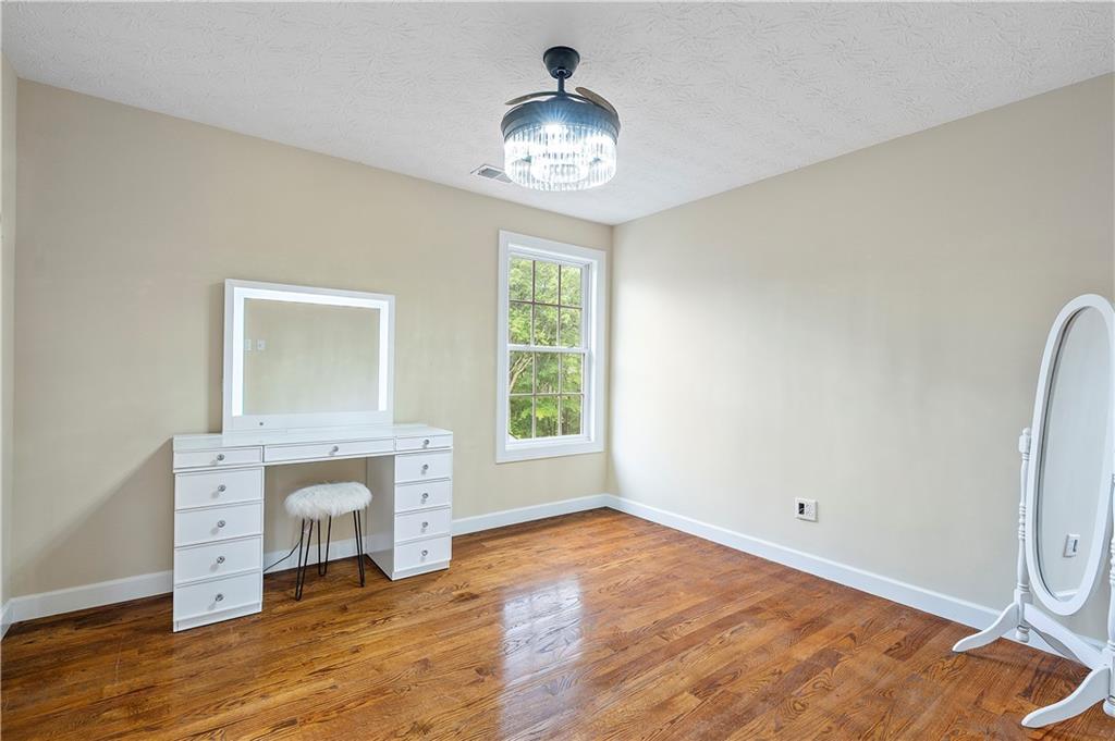 192 Baldwin Road Carnegie, PA 15106 - Photo 33 of 50 a view of livingroom with hardwood floor and a ceiling fan