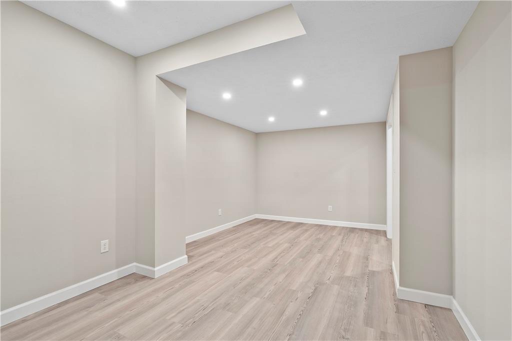 192 Baldwin Road Carnegie, PA 15106 - Photo 40 of 50 a view of an empty room with wooden floor