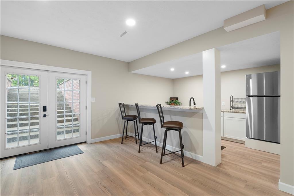 192 Baldwin Road Carnegie, PA 15106 - Photo 45 of 50 a view of a kitchen with dining table and chairs