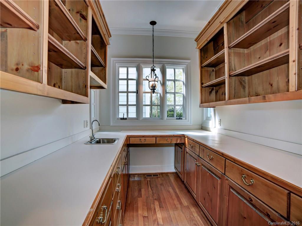 2101 Scotland Ridge Road Charlotte, NC 28211 - Photo 12 of 24 a kitchen with a sink and a window