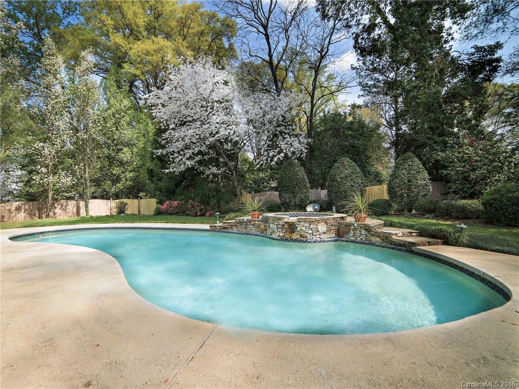 2101 Scotland Ridge Road Charlotte, NC 28211 - Photo 21 of 24 a view of a swimming pool with a yard